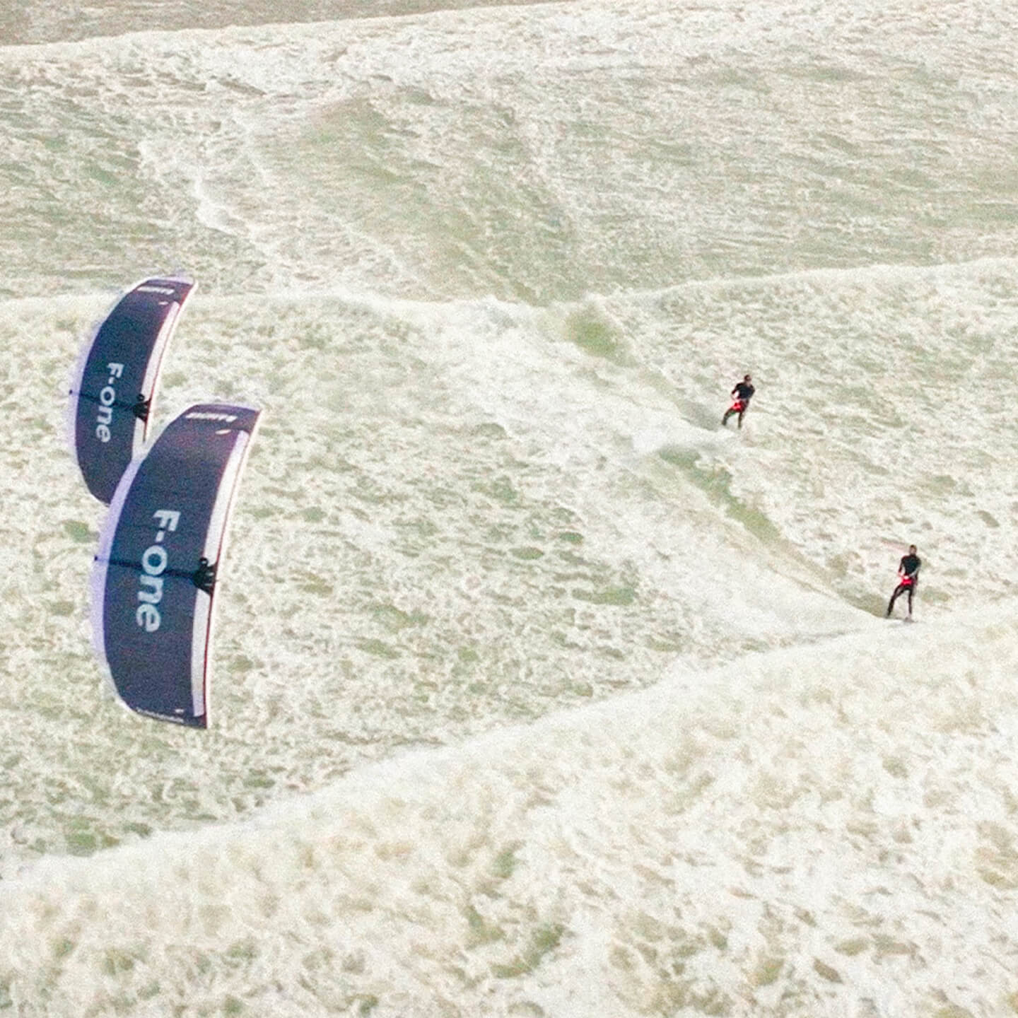 F-One Banger QuadX Kite action shot riding waves