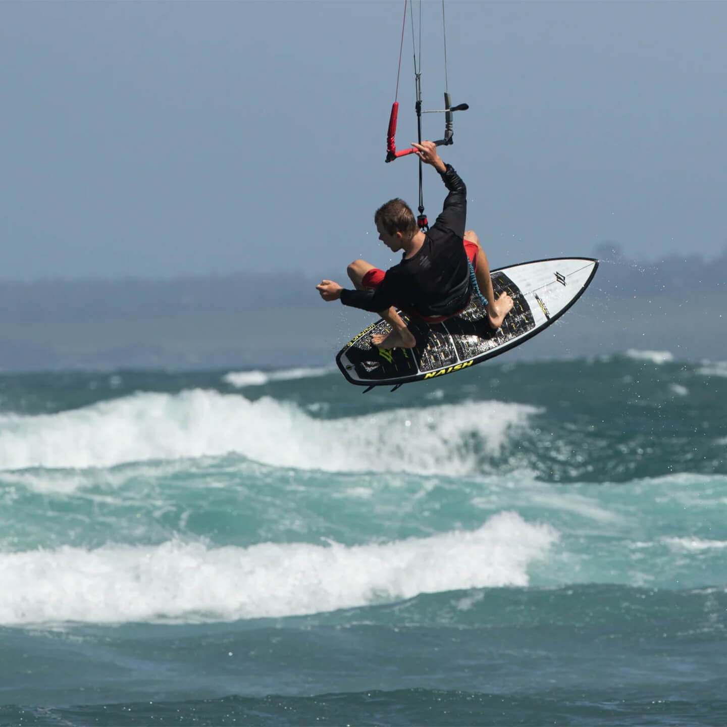 Naish Kokomo Kite Surfboard 2026 jumping action shot