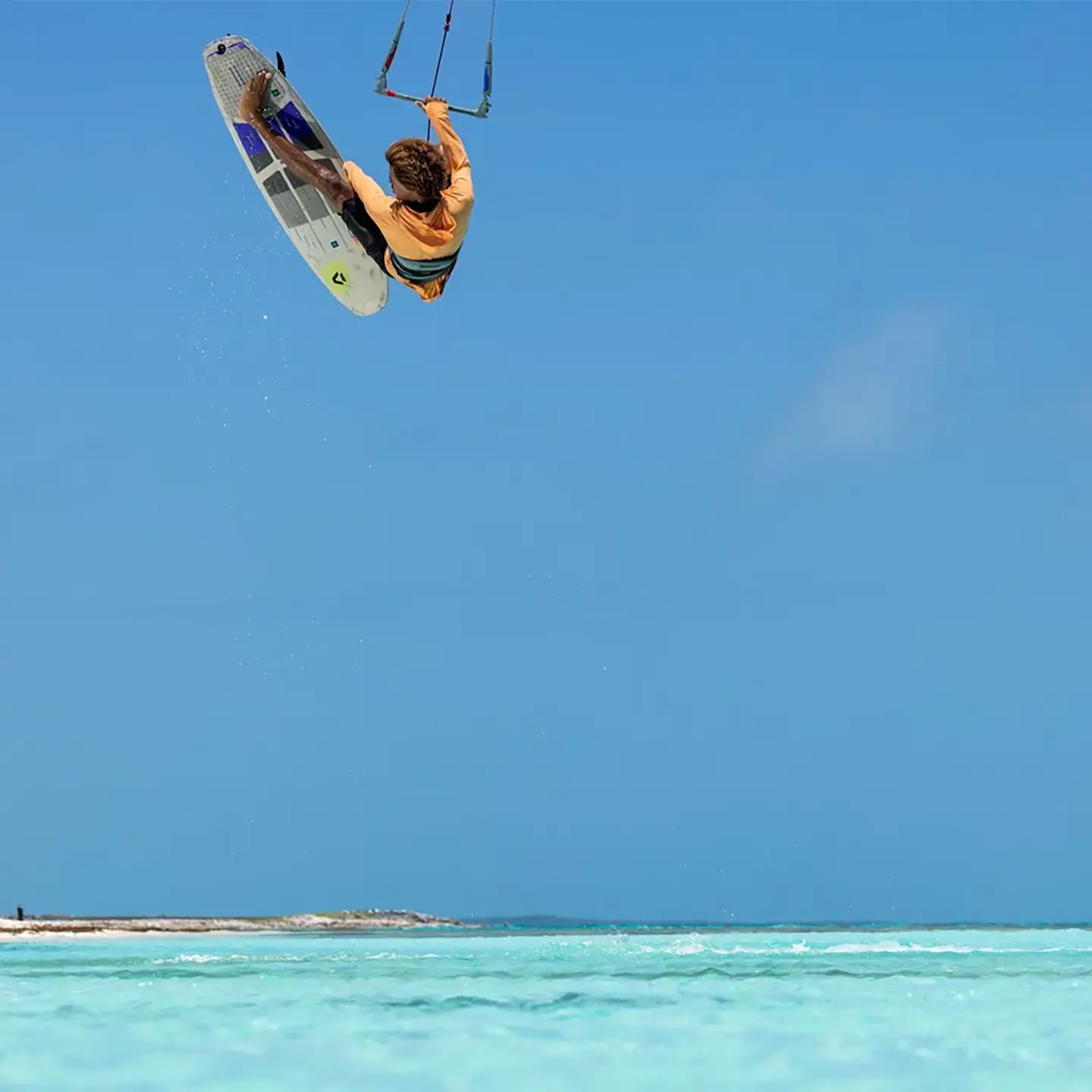 Duotone Whip D/LAB 2027 kite surfboard, alternate angle showing the outline, rails and fin setup